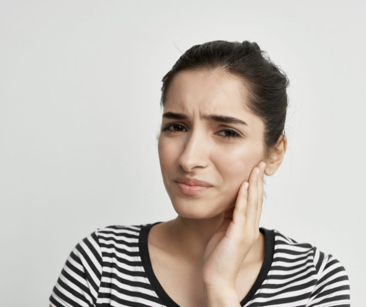 woman with tooth pain