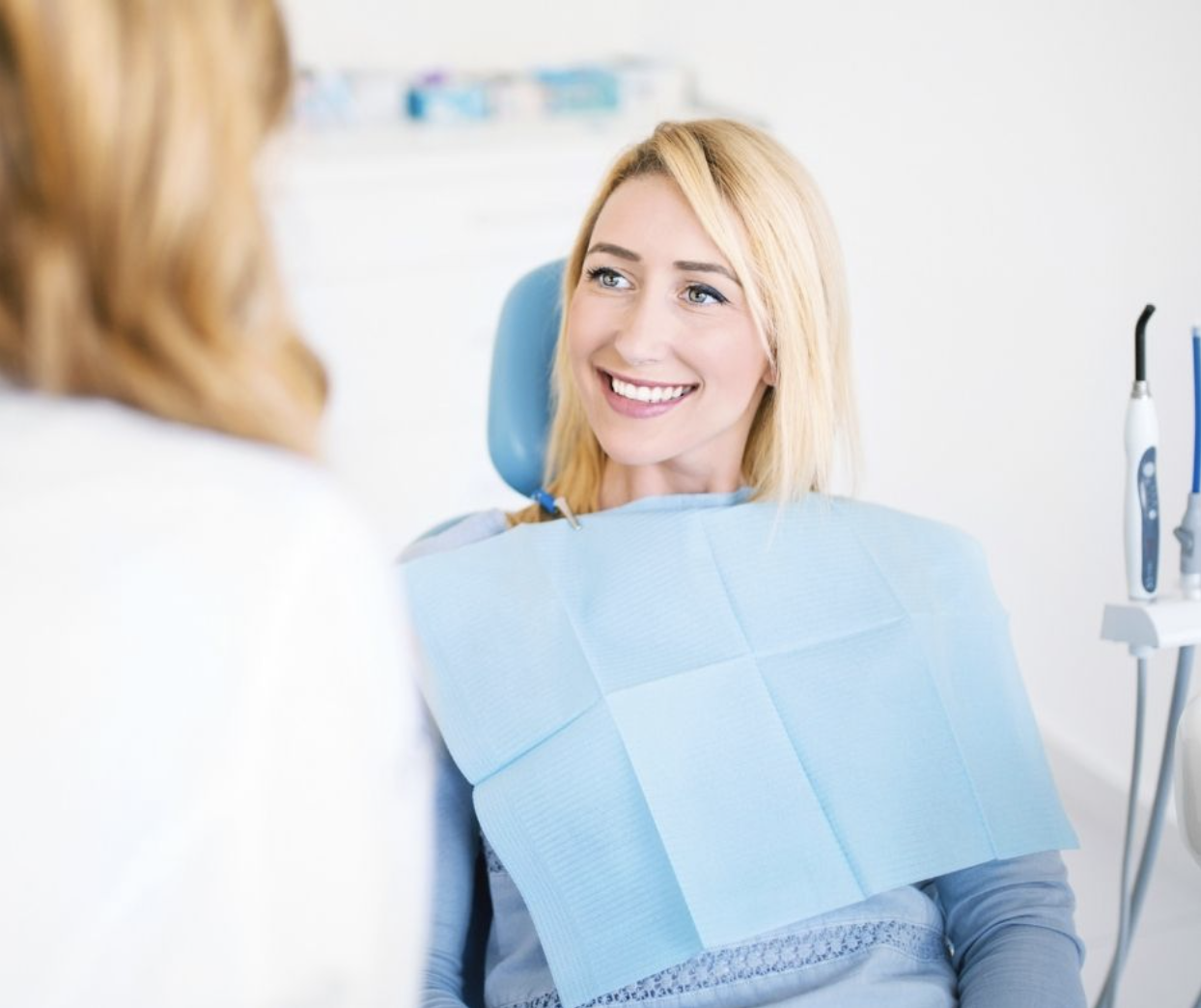 patient smiling at the dentist