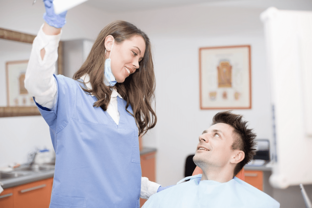 dentist treating patient's dental problems