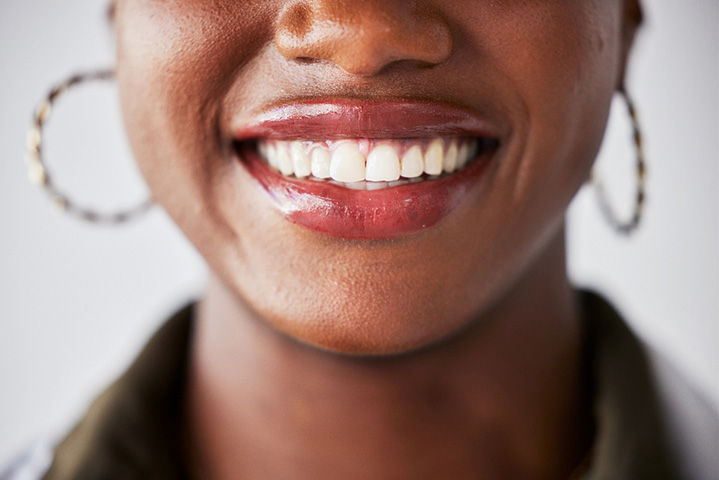 A close-up of a smiling woman